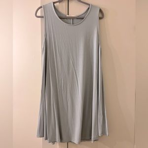 Pants store. Sleeveless green shift dress